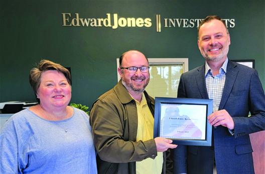 The February 2023 Business of the Month award was presented to Edward Jones Kevin Florer located at 900 E. Prospect, Suite 900. Pictured from left to right: Lorie Jackson, Ben Evans, and Kevin Florer. (Photo provided)
