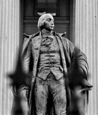 A statue of Alexander Hamilton stands in front of the Treasury Department in Washington, DC. U.S. (Anna Moneymaker/Getty