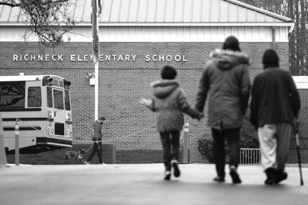 Students return to Richneck Elementary in Newport News, Virginia, on Monday, Jan. 30, 2023, for the first time since a 6-year-old shot teacher Abby Zwerner three weeks prior. (Billy Schuerman/The Virginian-Pilot/TNS)