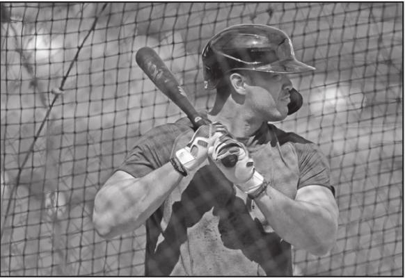 NEW YORK Yankees’ Giancarlo Stanton takes batting practice during a spring training baseball workout Tuesday, in Tampa, Fla. (AP Photo)
