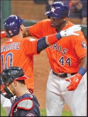 YULI GURRIEL (10) of the Houston Astros celebrates with teammate Yordan Alvarez during Game 7 of the 2019 baseball World Series in Houston. Alvarez has been named the American League Rookie of the Year. (AP Photo)