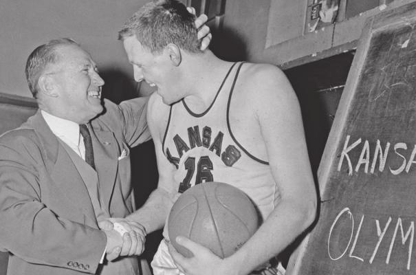 KANSAS COACH Phog Allen, left, talks to his star player Clyde Lovellete. The two were part of the 1952 National championship team.