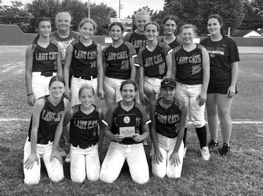 THE PONCA CITY Junior High Lady Cats finished in second place in the Blackwell Tournament last week. Team members include, bottom row from left, Rylee Gilliland, Gracie George, Maddie Stafford, Jaydyn Lara; second row, Harper Clark, Mallory George, Gracee Mashburn, Sophia Howard, Hanna Smith; back row, Coach Sherri Laughlin, Bretten Springer, KJ Johnson and Assistant MacKenzie Laughlin. Photo provided.