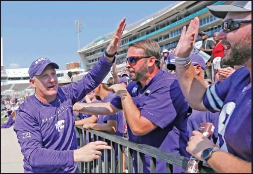 KANSAS STATE head coach Chris Klieman is congratulated by fans following the Wildcats win 31-24 over Mississippi State in Starkville, Miss., Sept. 14. K-State will be in Stillwater Saturday to play Oklahoma State. (AP Photo)