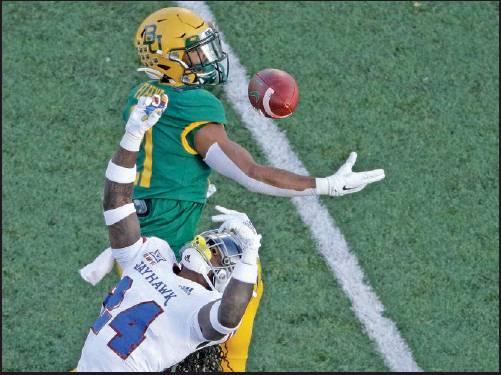 KANSAS SAFETY Ricky Thomas, bottom, intercepts a pass intended for Baylor wide receiver Josh Fleeks, top, during the f a football game Saturday in Lawrence, Kan. Baylor had no trouble in defeating the Jayhawks 61-6. (AP Photo)