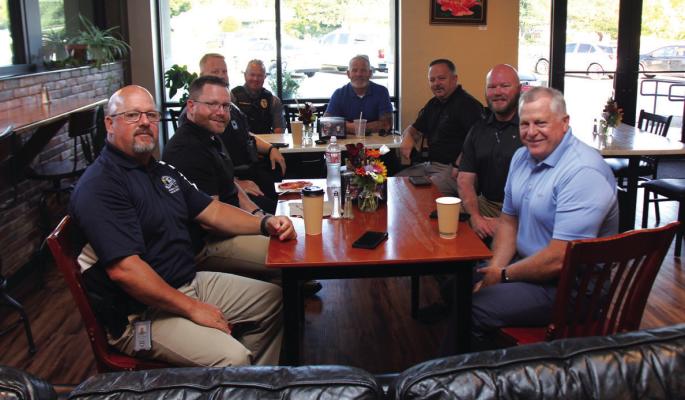 JOIN THE officers of the Ponca City Police Department on Wednesday mornings from 7 am to 9 am at The Perk for Coffee with a Cop. This is their attempt to connect with the people in the community by giving the opportunity to sit down and interact with the people who have vowed to protect and serve. The officers are asking that people in the community stop by and have a cup of coffee and a great conversation with the officers of Ponca City. (Photo by Dailyn Emery)