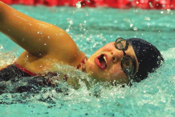 ALICIA ANDERSON of Ponca City swims during a dual Thursday night with Tulsa’s Bishop Kelley at the Ponca City RecPlex. Bishop Kelley, a perennial state champion swim team defeated the Ponca City boys 127-37 and the Ponca City girls 89-46. This photo was provided by Larry Williams.