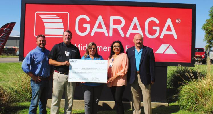 Ponca City Development Authority (PCDA) and the City of Ponca City were on hand recently as an incentive payment was paid to Garaga-Mid America Door. From left to right: PCDA Trustee Garrett Bowers, Garaga-Mid America Chief Financial Officer Carl Christenson, Melissa Noles, Sofia Williams and Ponca City Mayor Homer Nicholson. (Photo by Calley Lamar)