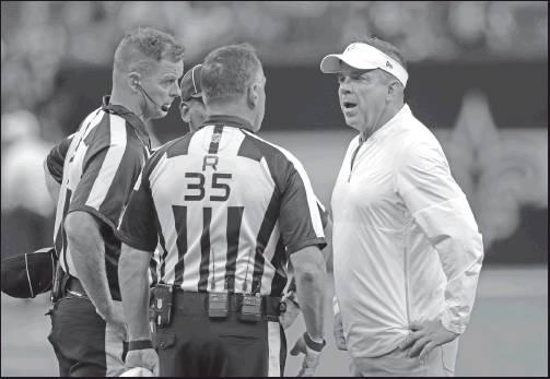 NEW ORLEANS New Orleans Saints head coach Sean Payton talks to league referees before a Sept. 9 NFL game against the Houston Texans, in New Orleans. The Saints visit Los Angeles for a rematch of the NFC championship game won by the Rams, but remembered for the no-call that created the opening for the Rams to storm through. (AP Photo)