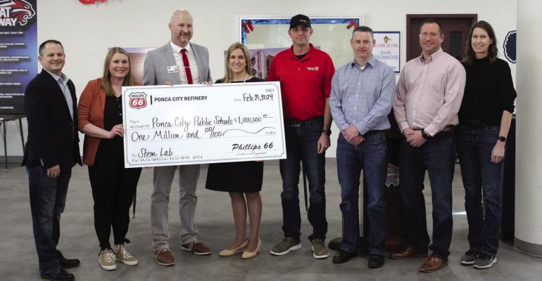 A $1 million check was presented to PCPS from Phillips 66 for the new STEM facility at Ponca City High School. Refinery Leadership Team members present at the press conference included Heath Wanamaker; General Manager; Kevin Schmitt, Operations Manager; Chad Scantlin, Technical Services Manager; Sara King, HSE Manager; and Erin Liberton, Communication Relations and Public Affairs. (Photo by Calley Lamar)
