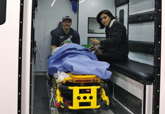 PIONEER TECHNOLOGY Center (PTC) is using cutting-edge technology with a true-to-life replica of an actual ambulance patient compartment, that is significantly enhancing the training experience for EMT and Paramedic students at Pioneer Tech. Pictured left to right are Firefighter/EMT students Hunter Freeman and Megan Roddy both from Ponca City. (Photo provided)