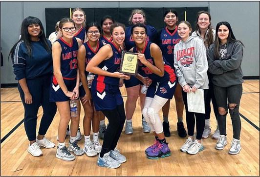 The eighth grade girls basketball team beat Edmond Cimarron in overtime to win third place over the weekend in the Edmond Tournament. Photo provided.