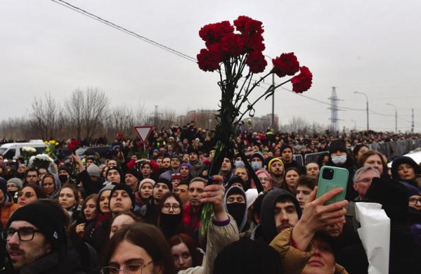 MOURNERS ATTEND a funeral ceremony for late Russian opposition leader Alexei Navalny at the Borisovo cemetery in Moscow’s district of Maryino on March 1, 2024. (Olga Maltseva/AFP/Getty Images/TNS)
