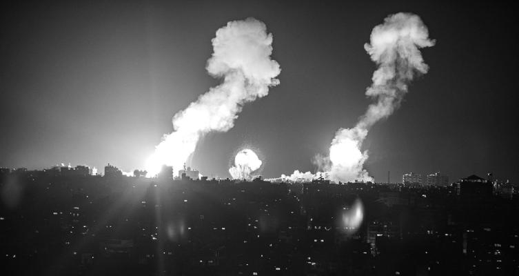 This picture taken early on April 7, 2023, shows explosions in Khan Yunis in the southern Gaza Strip during Israeli air strikes on the Palestinian enclave. (Yousef Masoud/AFP via Getty Images/TNS)