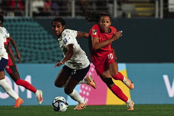 USA’S DEFENDER (4) Naomi Girma (L) and Portugal’s forward (10) Jessica Silva vie for the ball during the Australia and New Zealand 2023 Women’s World Cup Group E football match between Portugal and the United States at Eden Park in Auckland on August 1, 2023. (Saeed Khan/AFP via Getty Images/TNS)