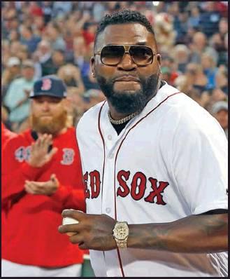 FORMER BOSTON Red Sox’s David Ortiz comes onto the field to throw out a ceremonial first pitch before a baseball game against the New York Yankees in Boston Monday. (AP Photo)