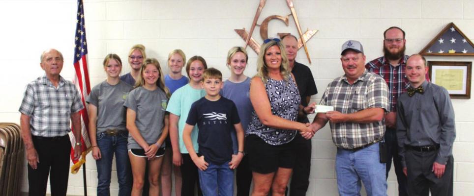 Ponca Masonic Lodge 83 demonstrated their commitment to fraternal charity by partnering with the Ponca City 4H and FFA Livestock Booster Club for another year to aide in providing funds instrumental to the youth of the community. (Photo by Calley Lamar)
