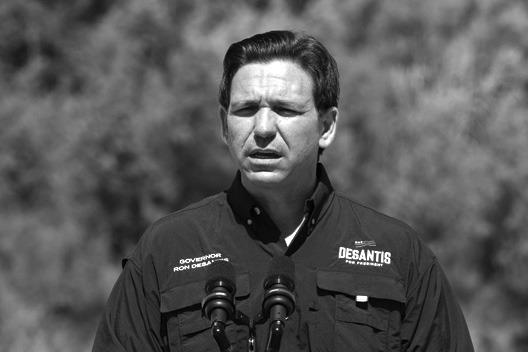 FLORIDA GOVERNOR and 2024 Republican Presidential hopeful Ron DeSantis speaks during a news conference near the Rio Grande River in Eagle Pass, Texas, on June 26, 2023. DeSantis engaged with voters and residents in border-adjacent communities during a campaign event. (Suzanne Cordeirro/AFP/Getty Images/TNS)