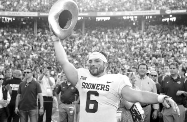 BAKER MAYFIELD celebrates after the Oklahoma Sooners defeated Texas during his career at OU. Mayfield, a quarterback who also played at Texas Tech won the Burlsworth award twice.