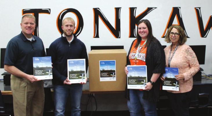 Tonkawa was one of 10 schools to receive STEM kits from NextEra Energy Resources. Pictured left to right are Mike Sanders, Bryce Kuhn, Cassie Jordan and Frances Wecker. (Photo by Calley Lamar)