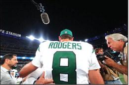 AARON RODGERS (8) of the New York Jets greets people on the field after a preseason game New York Giants at MetLife Stadium on Aug. 26, 2023, in East Rutherford, New Jersey. (Mike Stobe/ Getty Images/TNS)