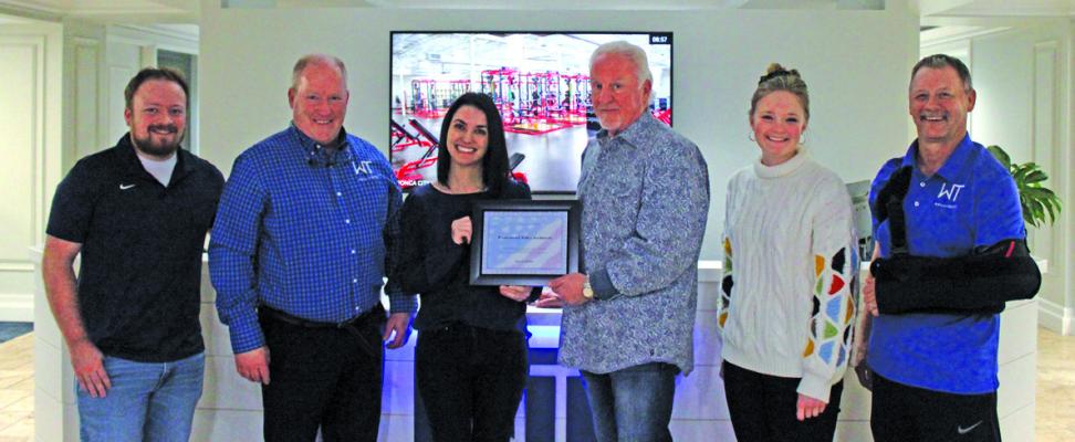 Following the Business Council meeting there was a presentation to Winterrowd Talley Architects recognizing them as the March Business of the Month. (Photo by Calley Lamar)