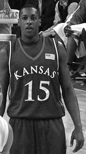 MARIO CHALMERS of Kansas hit a three-point basket at the buzzer to send the 2008 NCAA championship game against Memphis into overtime. Chalmer’s Jayhawks won the game in the overtime period to give Coach Bill Self his first NCAA title.