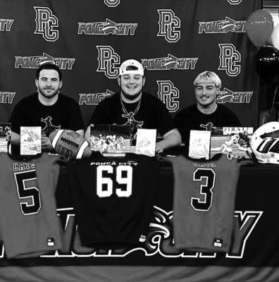 THREE PONCA CITY football seniors signed letters of intent to play college football at Northwestern Oklahoma State in Alva on Thursday. The signees are, from left, Rayden Agee, Trycten Boyer and Grant Harmon. At Po-Hi, Agee was a linebacker, Boyer was center on the offensive line, and Harmon played defensive back on defense and running back on offense.