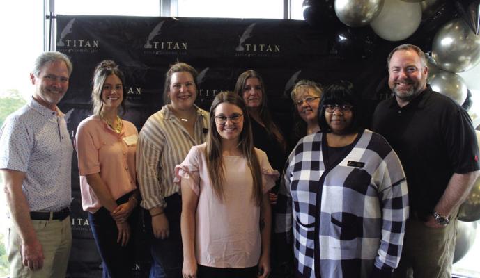 THE PONCA City Chamber Business After Hours event was hosted by Titan Title and Closing on Thursday, April 26 at the Ponca City Country Club. Pictured are staff at Titan. (Photo by Calley Lamar)