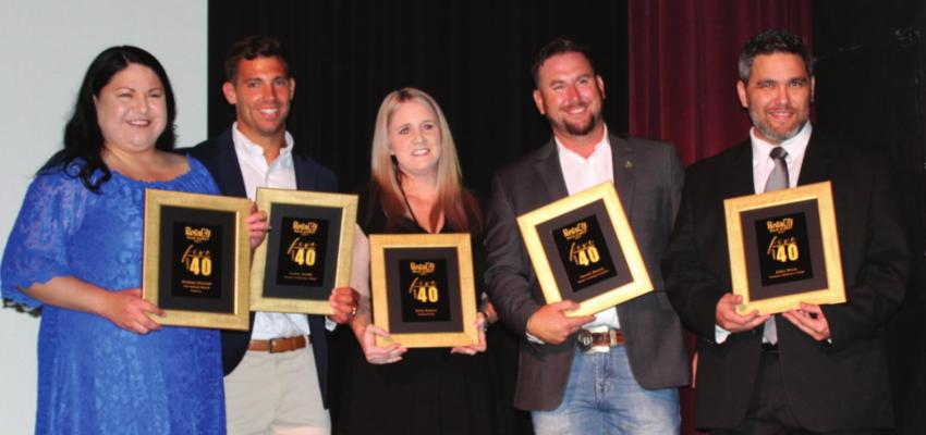 (Right) The recipients of the 5 Under 40 award. From left to right: Brittany Atauvich, Corbin Dewitt, Erica Fetters, Garrett Bowers, and Edward Dixon. (Photo by Calley Lamar)