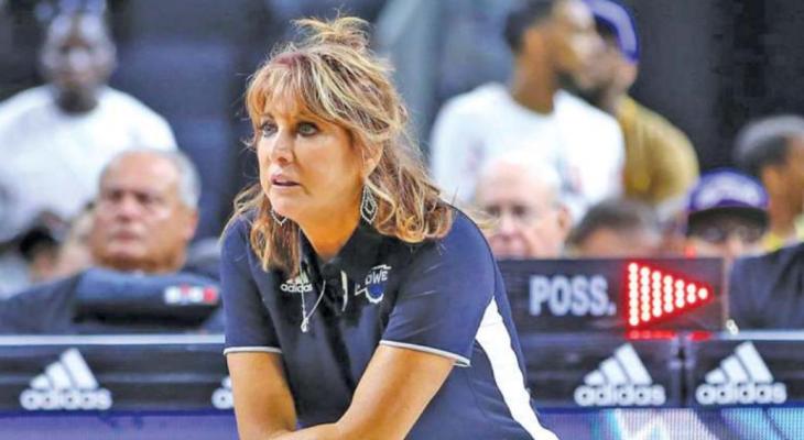 NANCY LIEBERMAN serving as an NBA assistant coach. She was the oldest woman basketball player in history, participating at age 50.