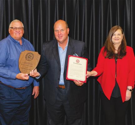 OUTGOING NORTHERN Oklahoma College Regent Chad Dillingham was honored at his final meeting Monday at NOC Tonkawa. Dillingham (center) was presented a plaque for his years of service by BOR Chairman Dale DeWitt (left) and NOC President Dr. Cheryl Evans (right).