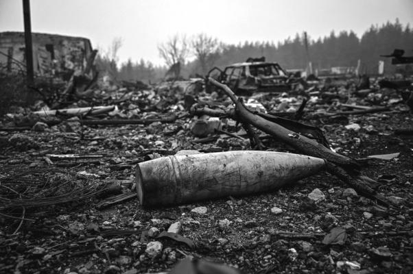This photograph, taken on December 13, 2022, shows a destroyed ammunition depot belonging to the Russian army on the outskirts of Izyum, Kharkiv region, amid the Russian invasion of Ukraine. (SERGEY BOBOK/AFP via Getty Images/TNS)