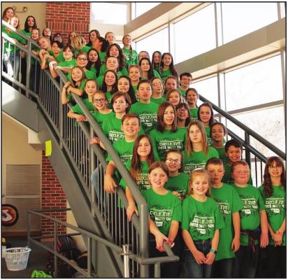 HONOR CHOIRS from East and West Middle Schools and Union and McCord Elementary Schools recently performed at the ''Circle the State With Song'' festival in Stillwater.