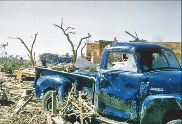 A BLUE TRUCK is one of the only recognizable objects after the May 25, 1955, Blackwell tornado that killed 23 people. The east side of Blackwell was destroyed with hundreds of people injured. The storm went on to hit Udall, Kansas only one hour later, where another tornado killed 84 people.