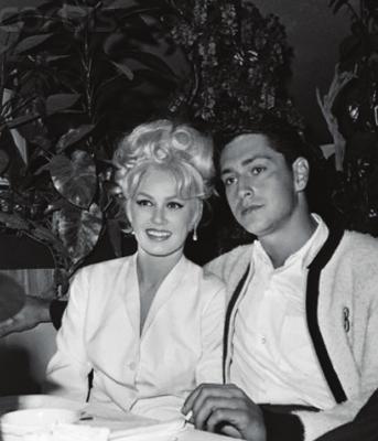 BO BELINSKY, shown here with his fiancee at the time Mamie Van Doren, dissapated a promising career with lots of running around as a young player for several baseball teams. He later changed his life.