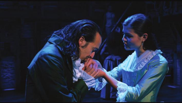 Lin-Manuel Miranda is Alexander Hamilton and Phillipa Soo is Eliza Hamilton in “Hamilton,” the filmed version of the original Broadway production. (Disney/TNS)