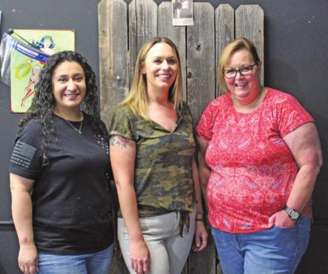 Pictured left to right: Sandra Walker, Amy Rae Arbona and Toni Smith. AfterShave Barbering Co.’s goal is to give clients the best haircut they’ve ever had. (Photo by Calley Lamar)