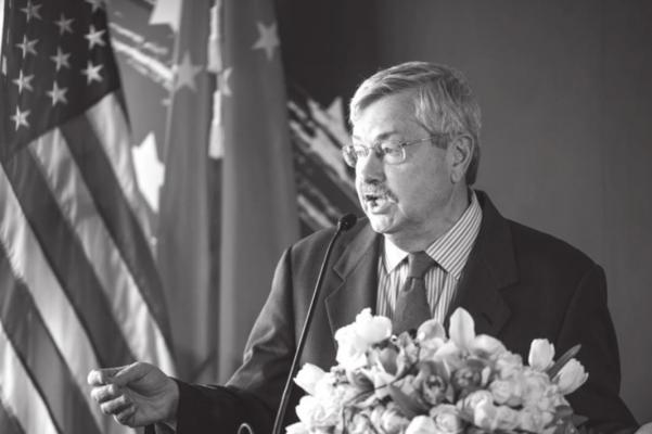 In this file photo, US Ambassador to China Terry Branstad speaks to guests and journalists during a promotional event for US beef in Beijing on June 30, 2017. Branstad announced Monday that he will retire from his position and return to the United States by early October.(FRED DUFOUR/AFP via Getty Images/TNS)
