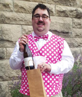 Mikel Montgomery won the bow tie contest, and got a great bottle of wine from the Wine Pull donation contest.