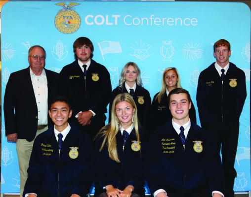 PICTURED ARE the Ponca City Adviser, Kevin Frazier, with Ponca City Officers. They are joined by two state FFA Officers. Sitting in the front row, far left, is Pedro Valles, Dover, state secretary. Sitting in the front row, far right, is Alec Anderson, Ringwood, northwest area vice-president. Photo provided