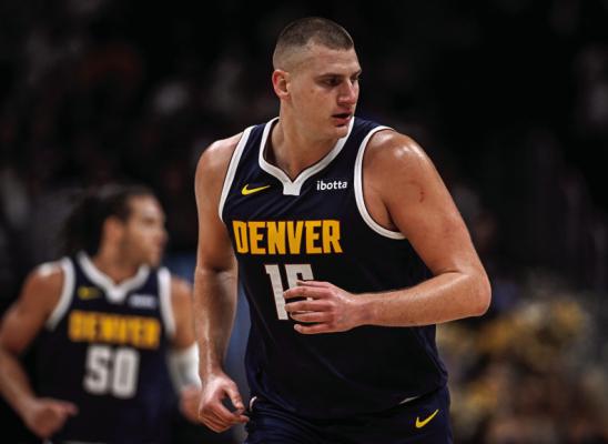 NIKOLA JOKIC (15) of the Denver Nuggets runs down court after making a three pointer against the Golden State Warriors during the second quarter at Ball Arena in Denver on Wednesday, November 8, 2023. (Photo by AAron Ontiveroz/The Denver Post)