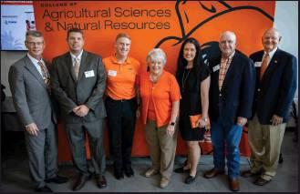 OKLAHOMA STATE University has opened the doors at the new, state-of-the-art Greenhouse Learning Center. Attending the official grand opening ceremony, from left, were Tom Coon, vice president of agricultural programs; Bruce Dunn, professor of floriculture and departmental greenhouse coordinator; Doug Hallenbeck, vice president of student affairs; Lou Watkins, OSU Regent; Blayne Arthur, Secretary of Agriculture; Calvin Anthony, OSU Regent; and Gary Clark, senior vice president and general counsel.