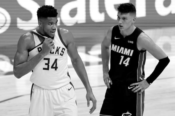 The Milwaukee Bucks’ Giannis Antetokounmpo (34) and the Miami Heat’s Tyler Herro (14) during the second quarter at American Airlines Arena in Miami on Tuesday, Dec. 29, 2020. Antetokounmpo poured in 54 points to help topple the Los Angeles Clippers Thursday, Feb. 2, 2023, in Milwaukee. (Michael Reaves/Getty Images/ TNS)