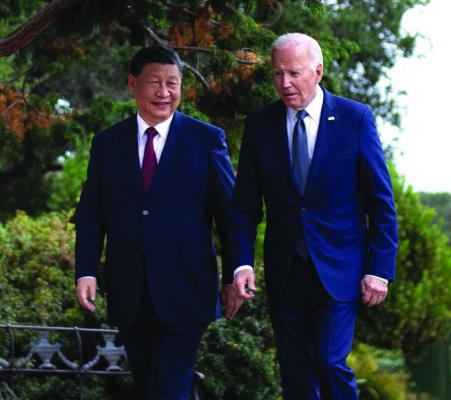 PRESIDENT JOE Biden, right, and Chinese President Xi Jinping walk together after a meeting during the Asia-Pacific Economic Cooperation (APEC) Leaders’ week in Woodside, California on Nov. 15, 2023. (Brendan Smialowski/AFP/Getty Images/TNS)