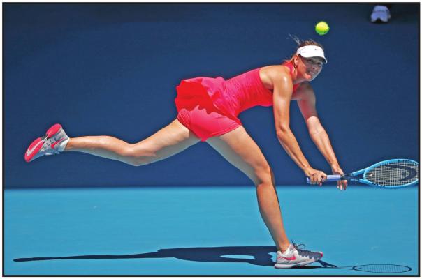 MARIA SHARAPOVA makes a backhand return to Croatia’s Donna Vekic during their first round singles match at the Australian Open tennis championship in Melbourne, Australia, Jan. 21. Sharapova announced her retirement from tennis on Wednesday. (AP Photo)