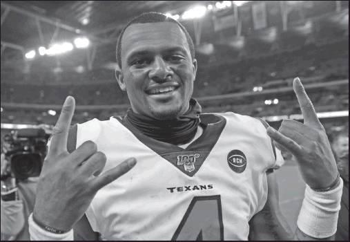 HOUSTON TEXANS quarterback Deshaun Watson (4) celebrates after an NFL game against the Jacksonville Jaguars at Wembley Stadium Nov. 3 in London. The Houston Texans won 26-3. Watson and Lamar Jackson of Baltimore will be on display this week as the two teams engage in battle. (AP Photo)