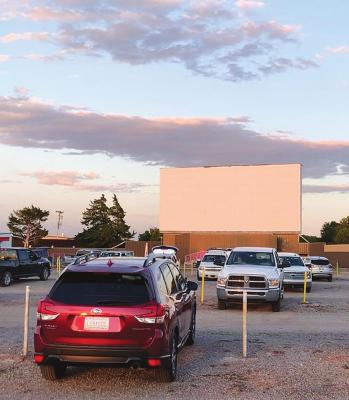 CUSTOMERS WAIT for “Back to the Future” to start after the sun sets at the Chief Drive-In in Ninnekah. Gov. Stitt expanded non-essential business closures to all 77 Oklahoma counties, which will affect drive-in theatres. Photo by Conner Caughlin, Gaylord News.