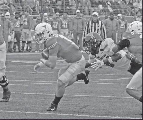 TEXAS QUARTERBACK Sam Ehlinger (11) runs for a touchdown during a football game against Texas Tech Nov. 29 in Austin, Texas. Texas is set to play Utah in the Alamo Bowl Tuesday. (AP Photo)
