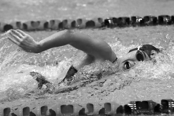 SARAH DINGUS of Ponca City swims during Tuesday’s triangular with Bishop Kelley and Putnam City North at the RecPlex. The Ponca City swimmers came away with a victory in combined points, but Bishop Kelley was the winner in girls’ competition. This photo was provided by Larry Williams.